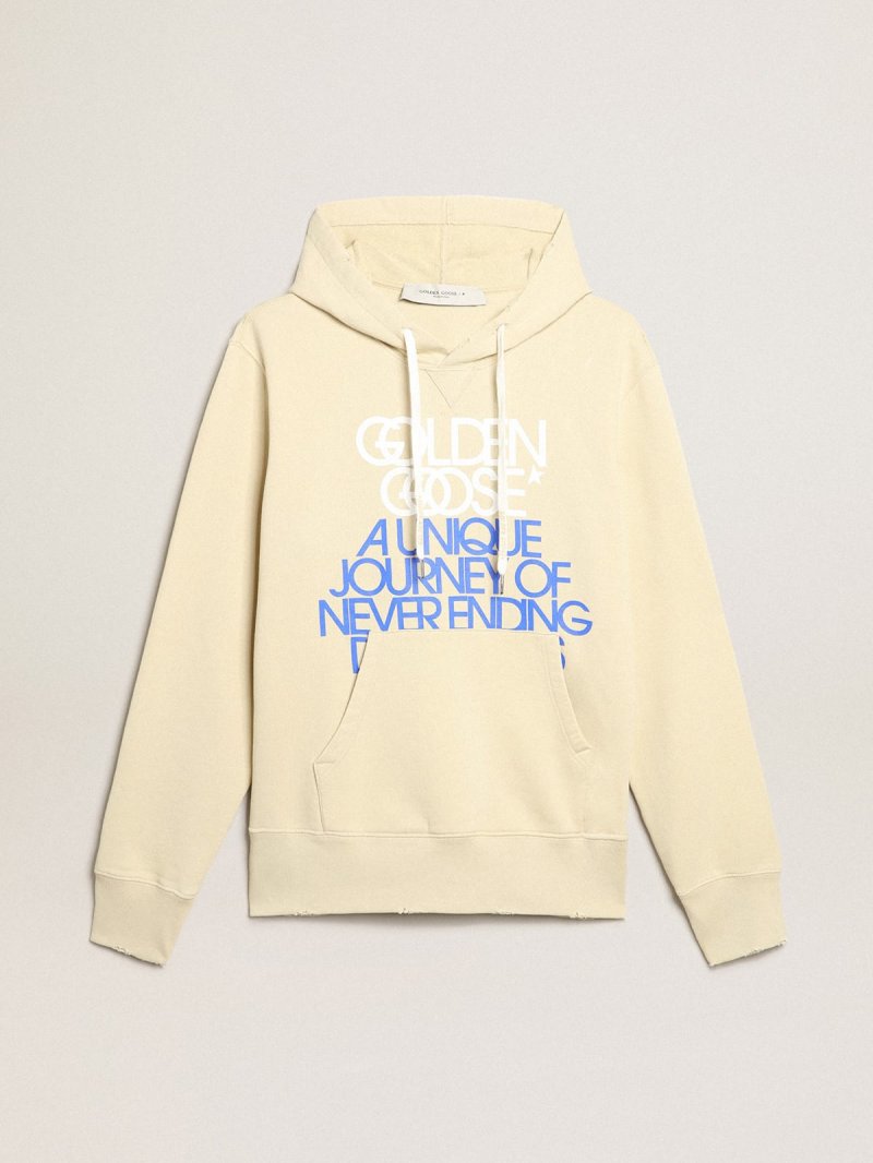 Marzipan-colored sweatshirt with lettering on the front