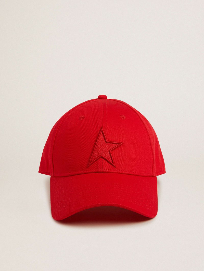 Red cotton baseball cap with tone-on-tone star-shaped patch on the front